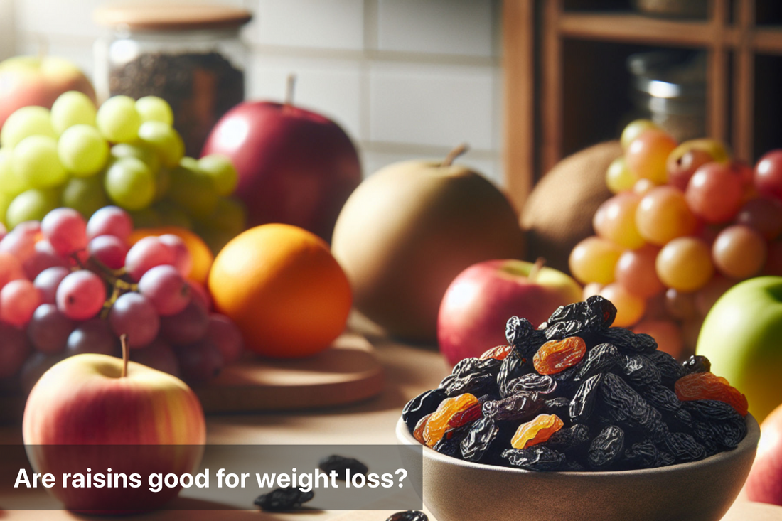 A variety of fruits with a bowl of raisins on a table