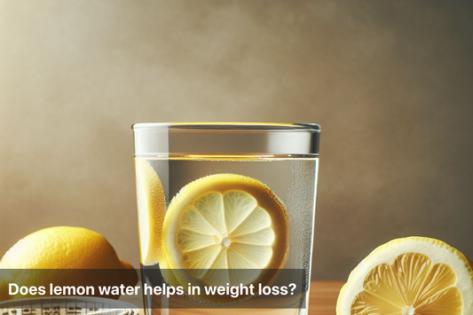 A glass of lemon water with fresh lemon slices