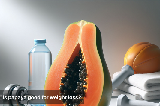 A papaya cut in half, a water bottle, dumbbells, and a towel.  A visual for papaya and weight loss.